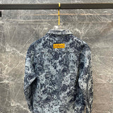 Side profile of Louis Vuitton luxury clothing with logo-detail design