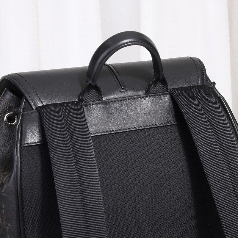 Handle and strap detail of sleek signature women's handbag – women's designer-style accessory