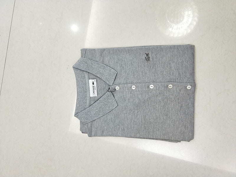 Side profile of Lacoste luxury clothing with tailored silhouette