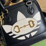 Side profile of polished statement women's handbag – women's luxury accessory
