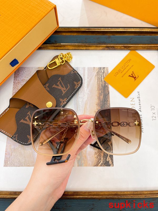 Close-up detail view of Louis Vuitton unisex sunglasses