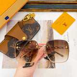 Close-up detail view of Louis Vuitton unisex sunglasses
