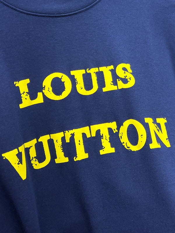 Flat lay presentation of Louis Vuitton luxury clothing with streetwear-inspired cut