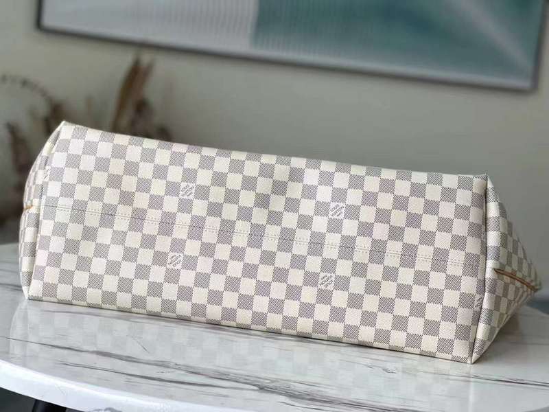 Styled lifestyle shot of refined statement women's handbag – women's luxury accessory