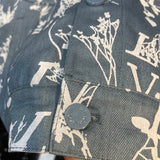 Front view of Louis Vuitton luxury clothing with label-forward styling