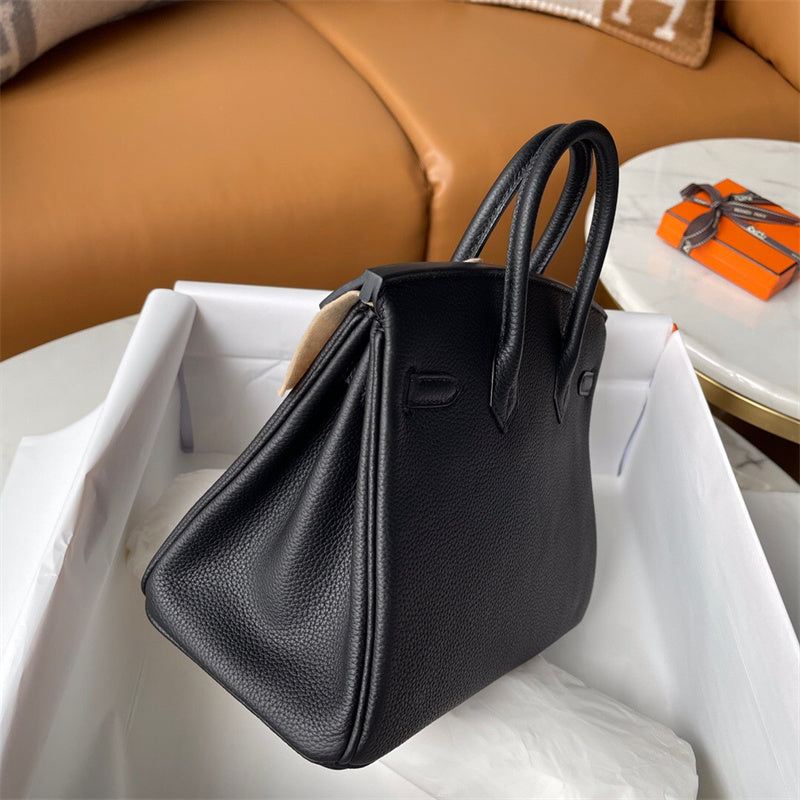  minimalist top-handle bag detail view showing craftsmanship 8