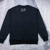 Side profile of Gucci luxury clothing with signature branding