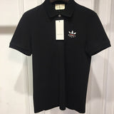 Full styled look of Gucci luxury clothing with monogram-inspired silhouette