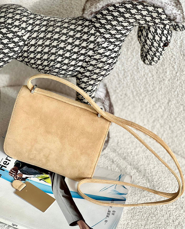 Side view of graceful structured handbag