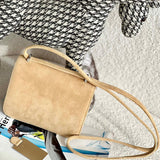 Side view of graceful structured handbag