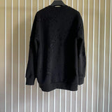 Givenchy clothing detail view — premium authentic designer style