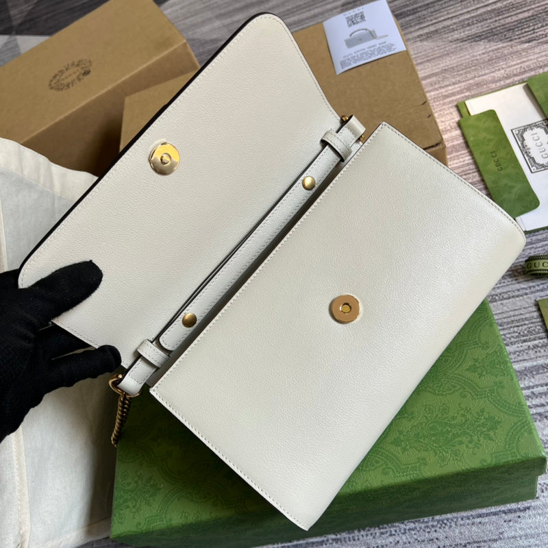 Styled lifestyle shot of everyday-luxe modern women's handbag – women's luxury accessory