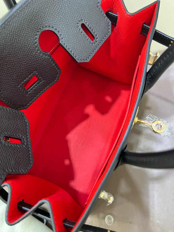 Side view of clean-lined structured handbag
