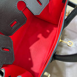 Side view of clean-lined structured handbag