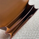 Side view of streamlined structured handbag