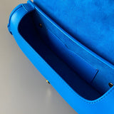 Styled lifestyle shot of statement sleek women's handbag – women's designer-style accessory