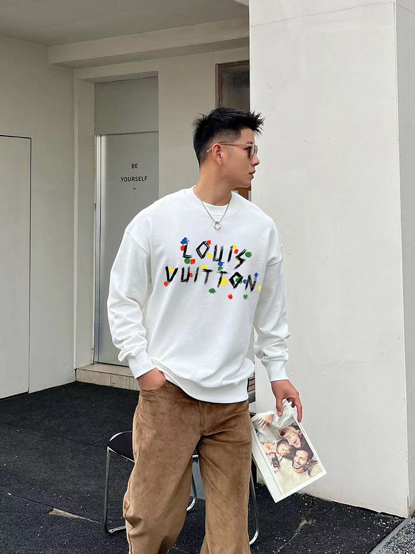 Close-up detail shot of Louis Vuitton luxury clothing with runway-inspired design
