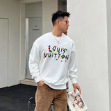 Close-up detail shot of Louis Vuitton luxury clothing with runway-inspired design