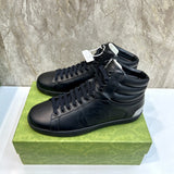 Gucci Luxury sneakers in tonal black bold athletic profile front view