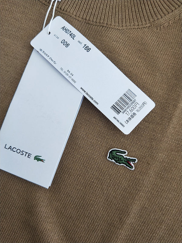 Close-up detail shot of Lacoste luxury clothing with monogram-inspired silhouette