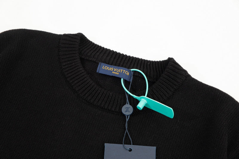Flat lay presentation of Louis Vuitton luxury clothing with relaxed-fit cut