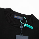 Flat lay presentation of Louis Vuitton luxury clothing with relaxed-fit cut