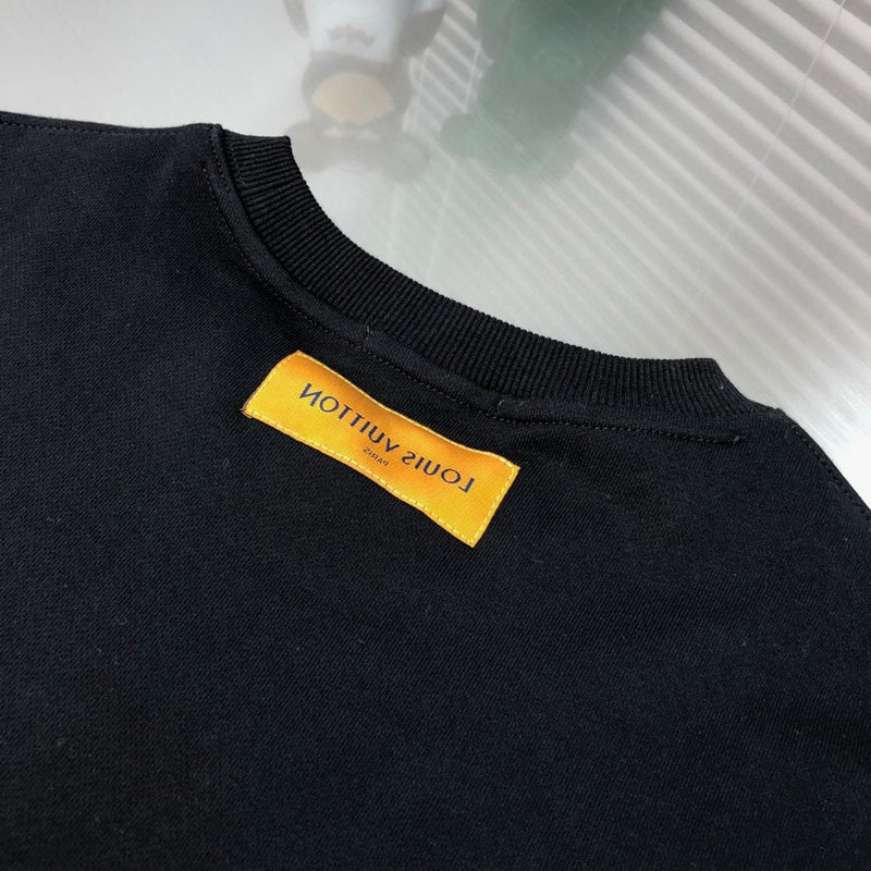 Back view of Louis Vuitton luxury clothing with signature branding