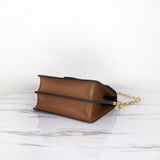 Interior view of modern signature women's handbag – women's designer-style accessory