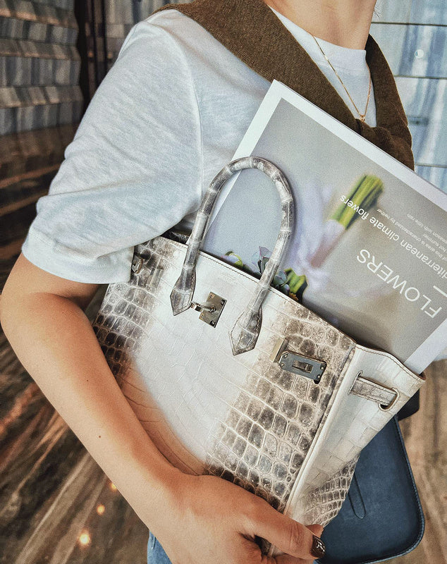 Side view of effortless structured handbag