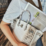 Side view of effortless structured handbag