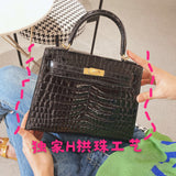Close-up detail of sculpted bag design