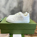 Gucci Designer sneakers in bold contrast signature lace-up style front view