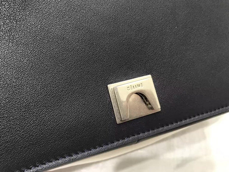 Side profile of statement refined women's handbag – women's luxury accessory