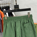 Front view of Rhude luxury clothing with label-forward styling