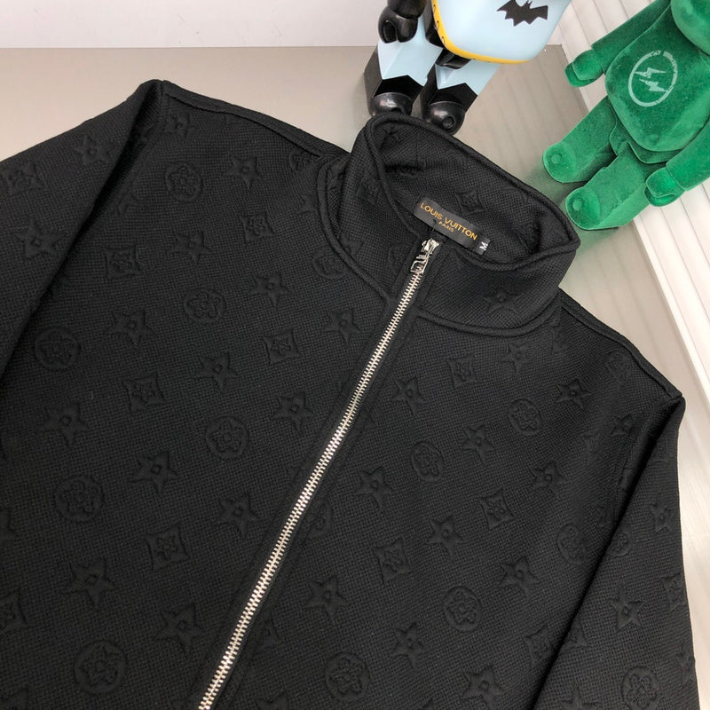 Full styled look of Louis Vuitton luxury clothing with signature branding