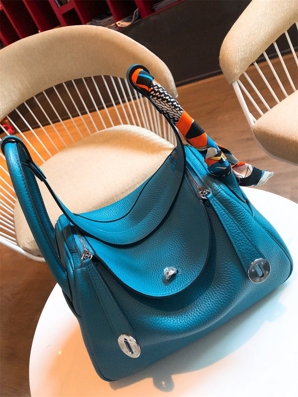 Side view of considered structured handbag
