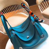 Side view of considered structured handbag