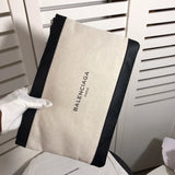 Handle and strap detail of structured signature women's handbag – women's luxury accessory