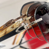 Side view of Cartier unisex sunglasses