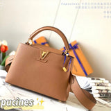 Front view of premium signature women's handbag – women's designer-style accessory