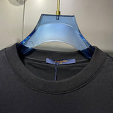 Front view of Louis Vuitton luxury clothing with runway-inspired design