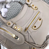Styled lifestyle shot of signature premium women's handbag – women's everyday handbag