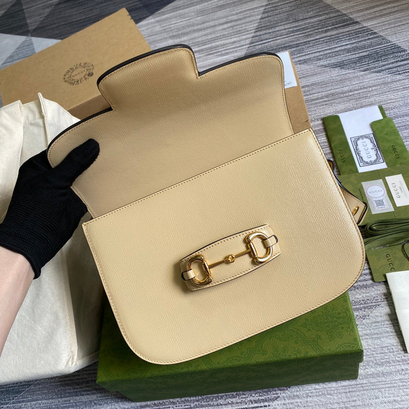 Front view of refined polished women's handbag – women's designer-style accessory