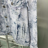 Back view of Louis Vuitton luxury clothing with signature branding