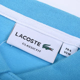 Close-up detail shot of Lacoste luxury clothing with signature branding
