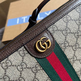 Styled lifestyle shot of structured statement women's handbag – women's luxury handbag