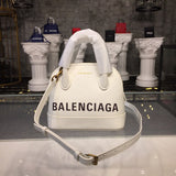 Contemporary Vegan Leather Handbag - Modern Structured Build | Women's Premium Handbag #889 - side angle view (image 2) of designer-inspired handbag
