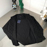 Flat lay presentation of Louis Vuitton luxury clothing with signature branding