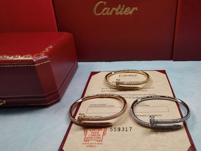Angled view of Cartier unisex jewelry piece