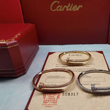 Angled view of Cartier unisex jewelry piece